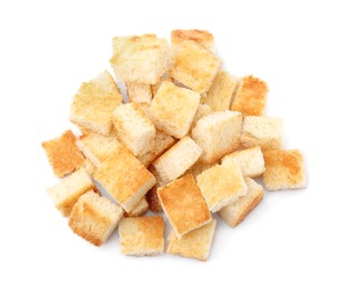 Photo of Delicious crispy croutons on white background, top view