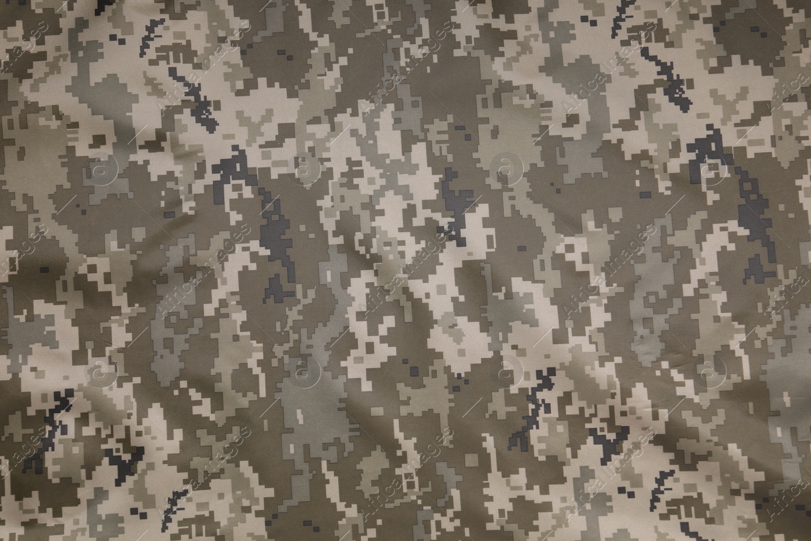 Photo of Texture of camouflage fabric as background, top view