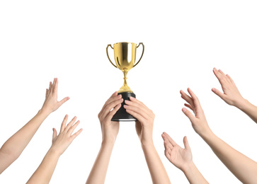 People with golden trophy cup on white background, closeup