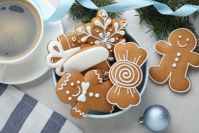 Photo of Delicious Christmas cookies on light table, flat lay