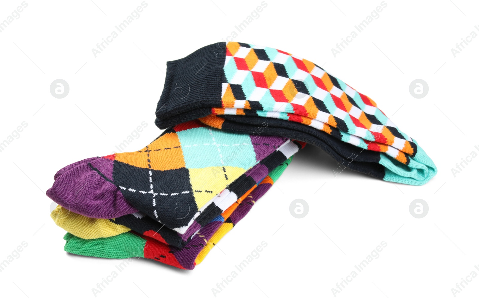 Photo of Many new colorful socks on white background