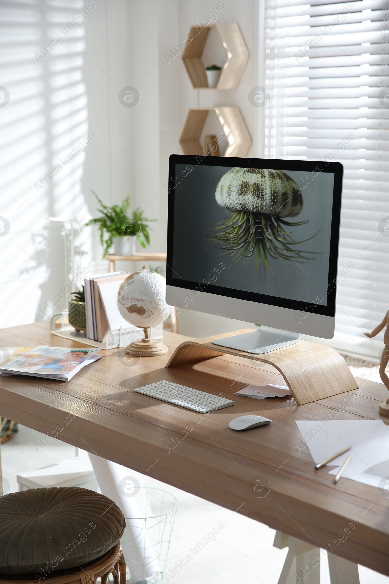 Photo of Stylish home office interior with comfortable workplace