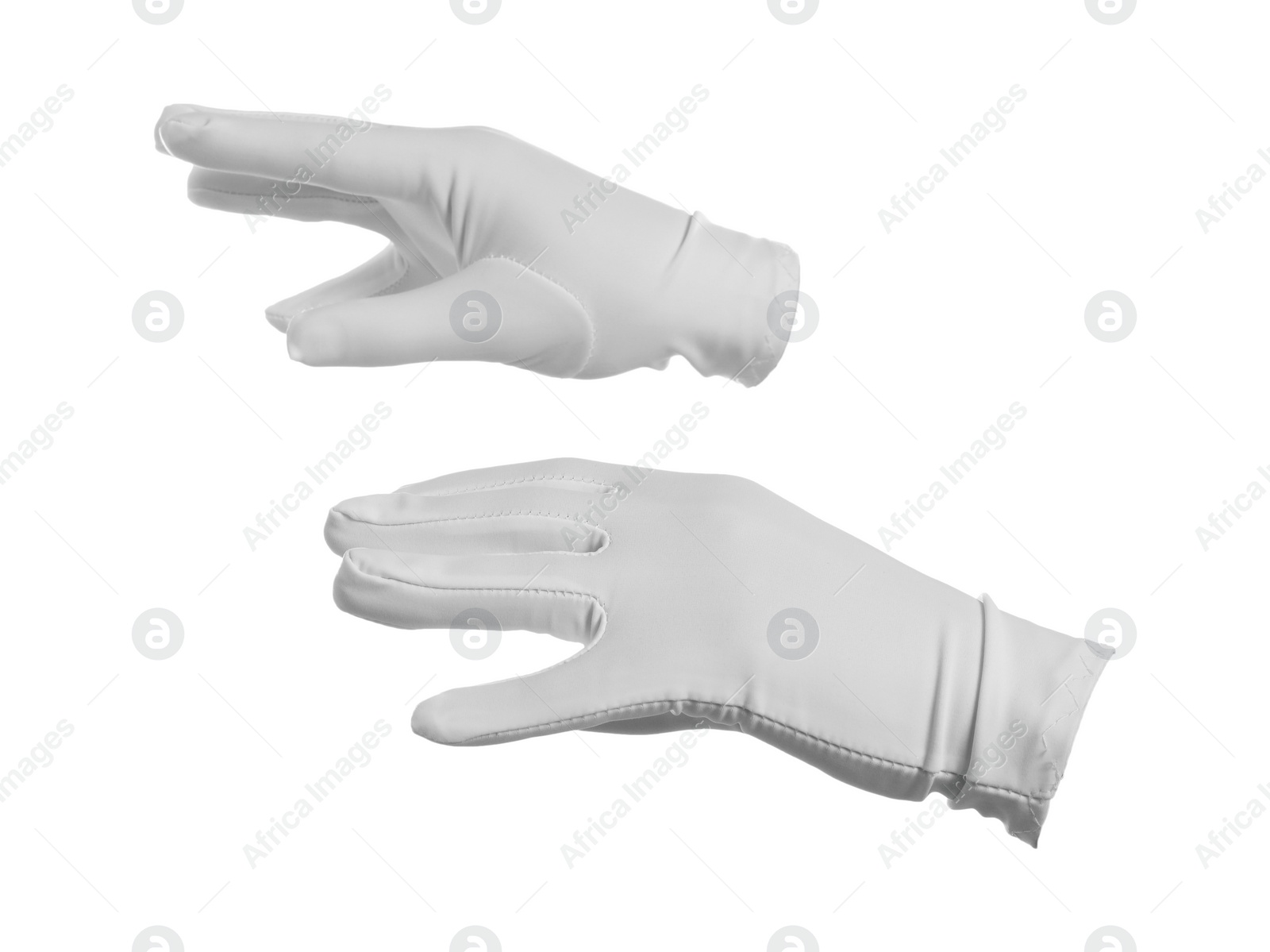 Photo of Magician holding something on white background, closeup