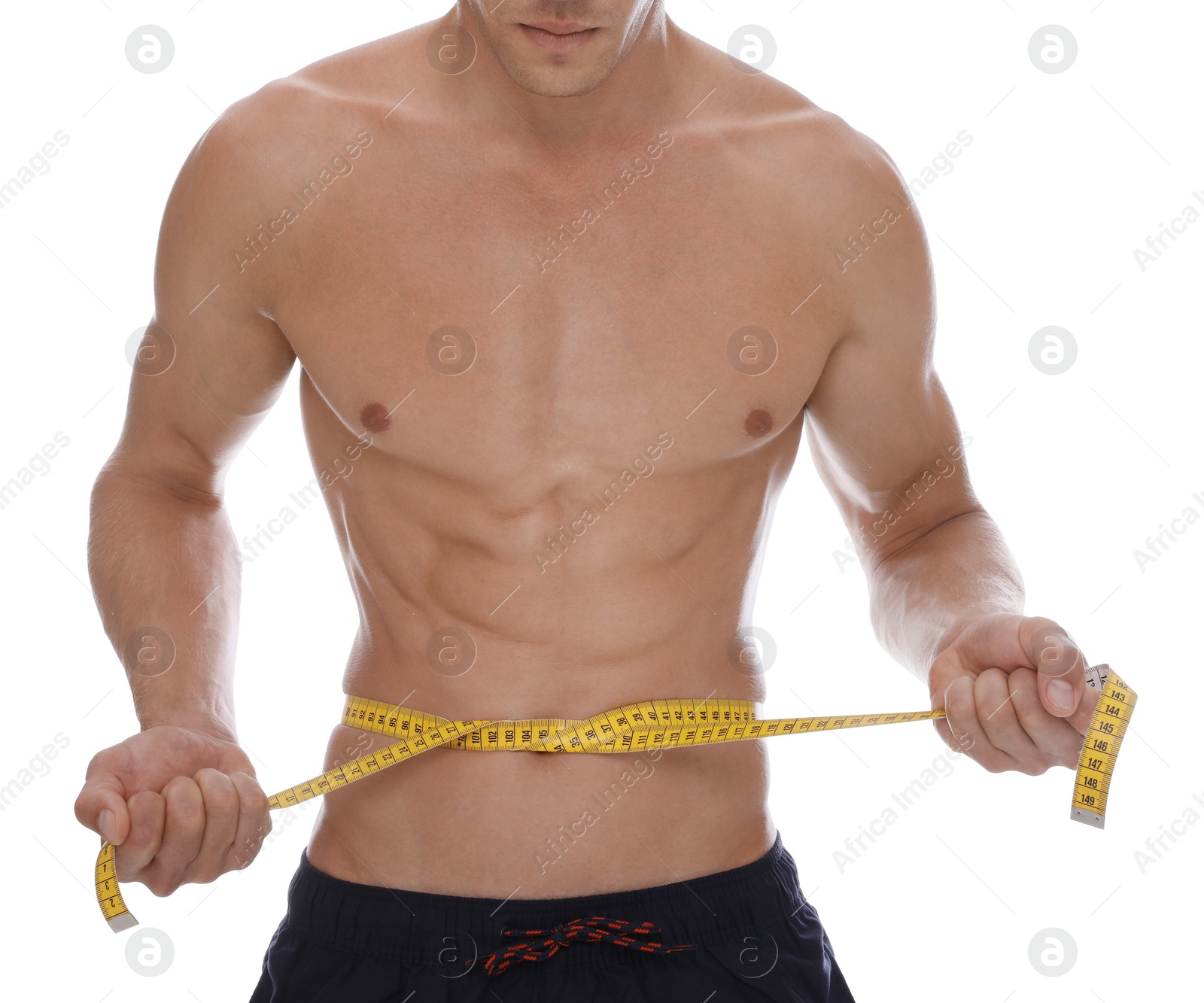 Photo of Shirtless man with slim body and measuring tape around his waist isolated on white, closeup