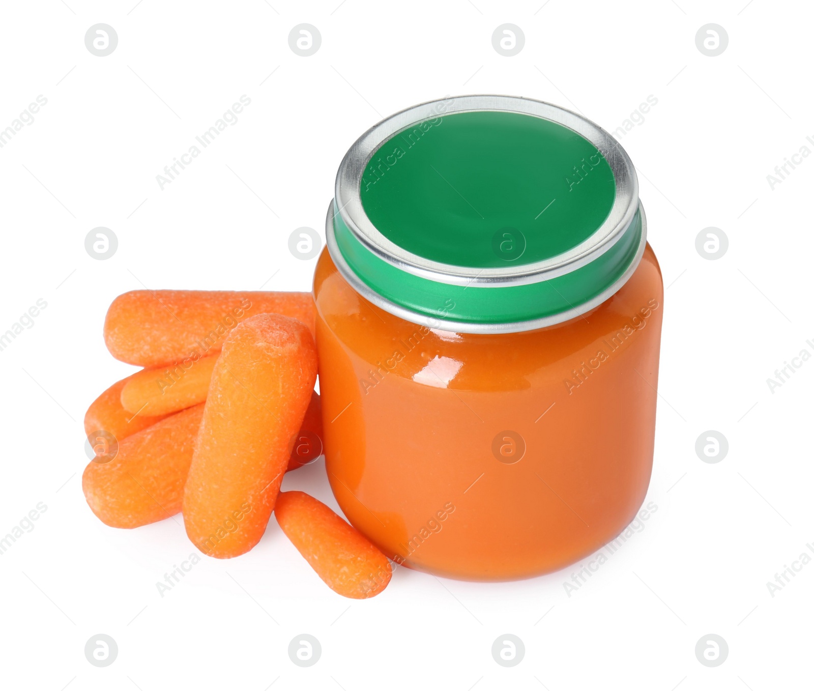 Photo of Tasty baby food in jar and fresh carrots isolated on white