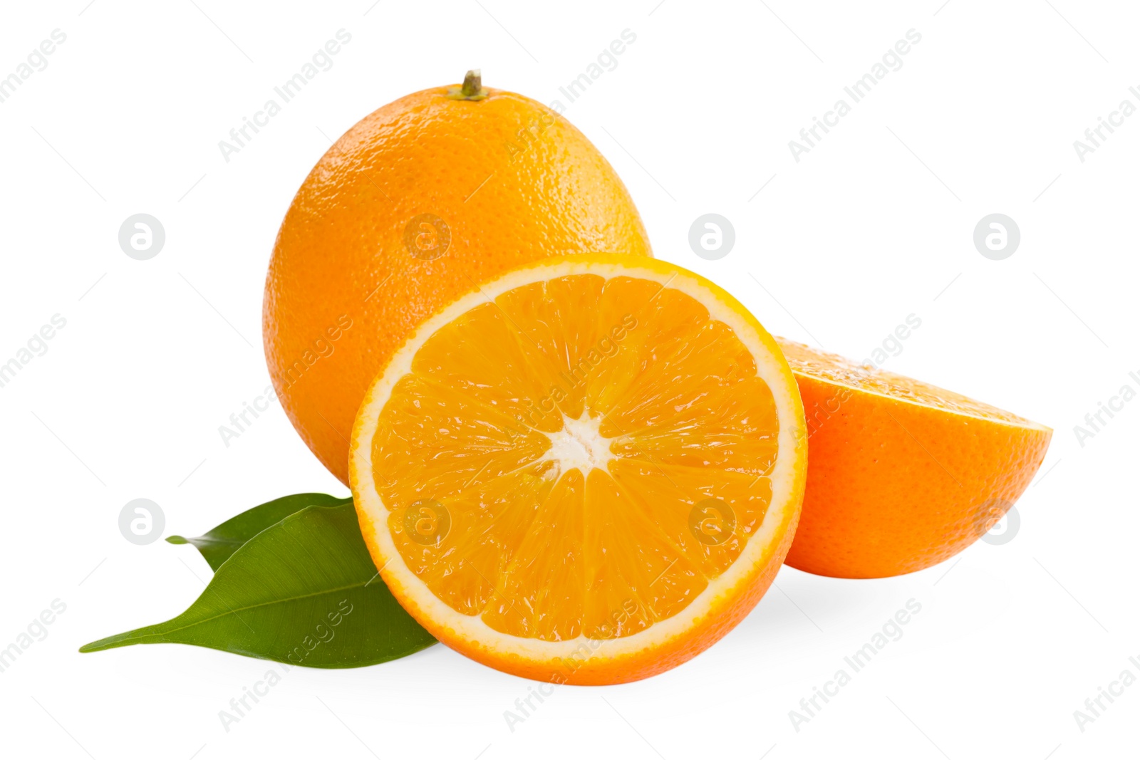 Photo of Whole and cut ripe oranges isolated on white