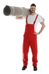 Photo of Male worker with rolled carpet on white background