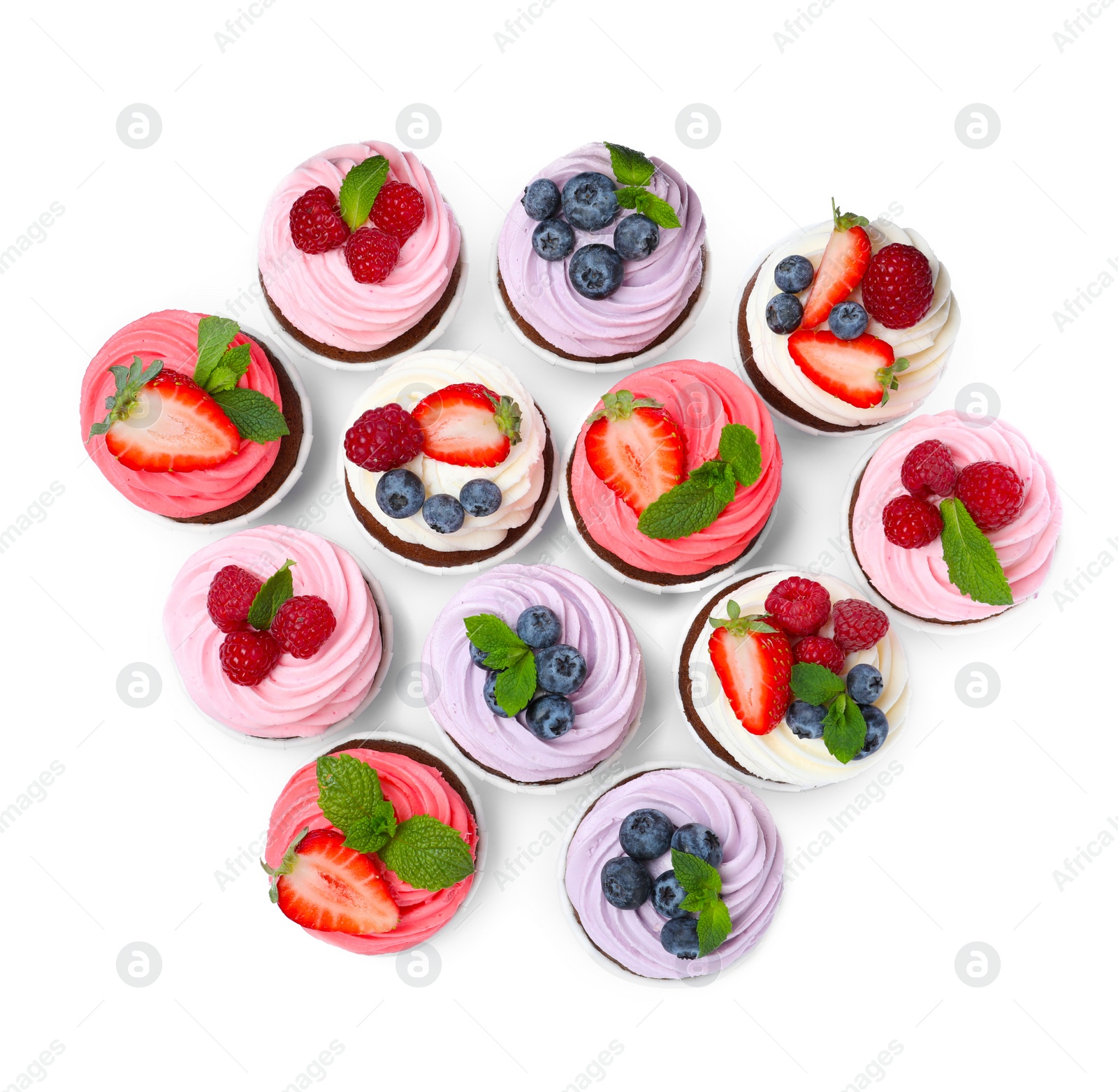 Photo of Sweet cupcakes with fresh berries on white background, top view