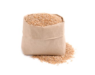 Photo of Dry wheat groats in paper bag isolated on white
