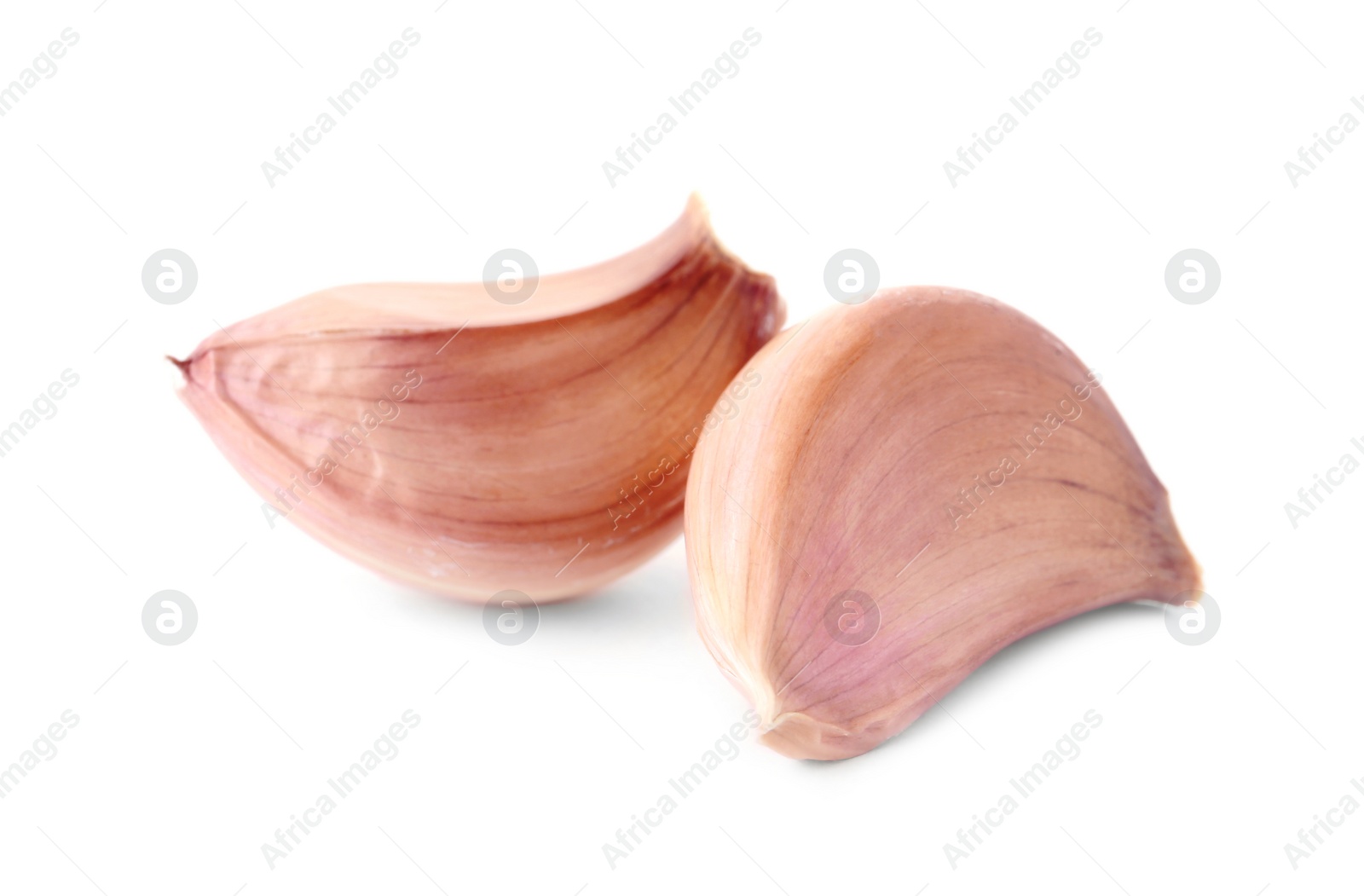 Photo of Fresh unpeeled garlic cloves on white background