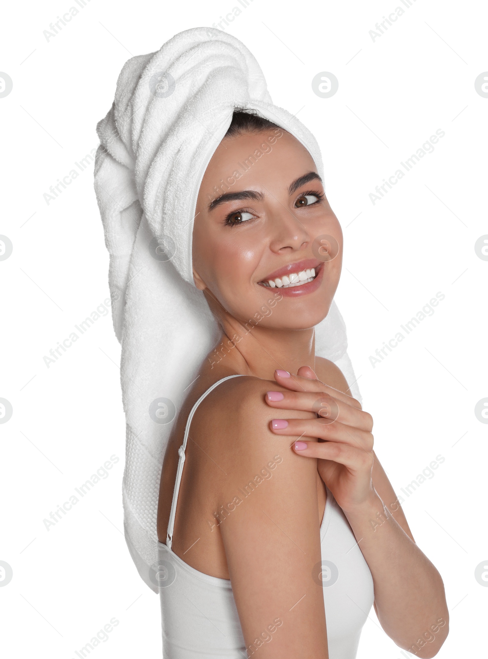 Photo of Beautiful young woman with towel on head against white background