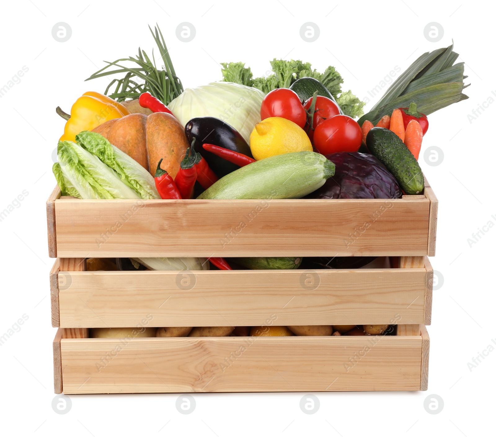 Photo of Fresh ripe vegetables and fruit in wooden crate on white background