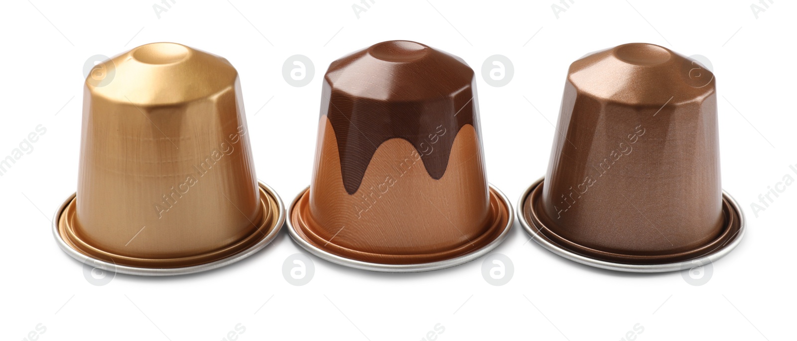 Photo of Three plastic coffee capsules isolated on white