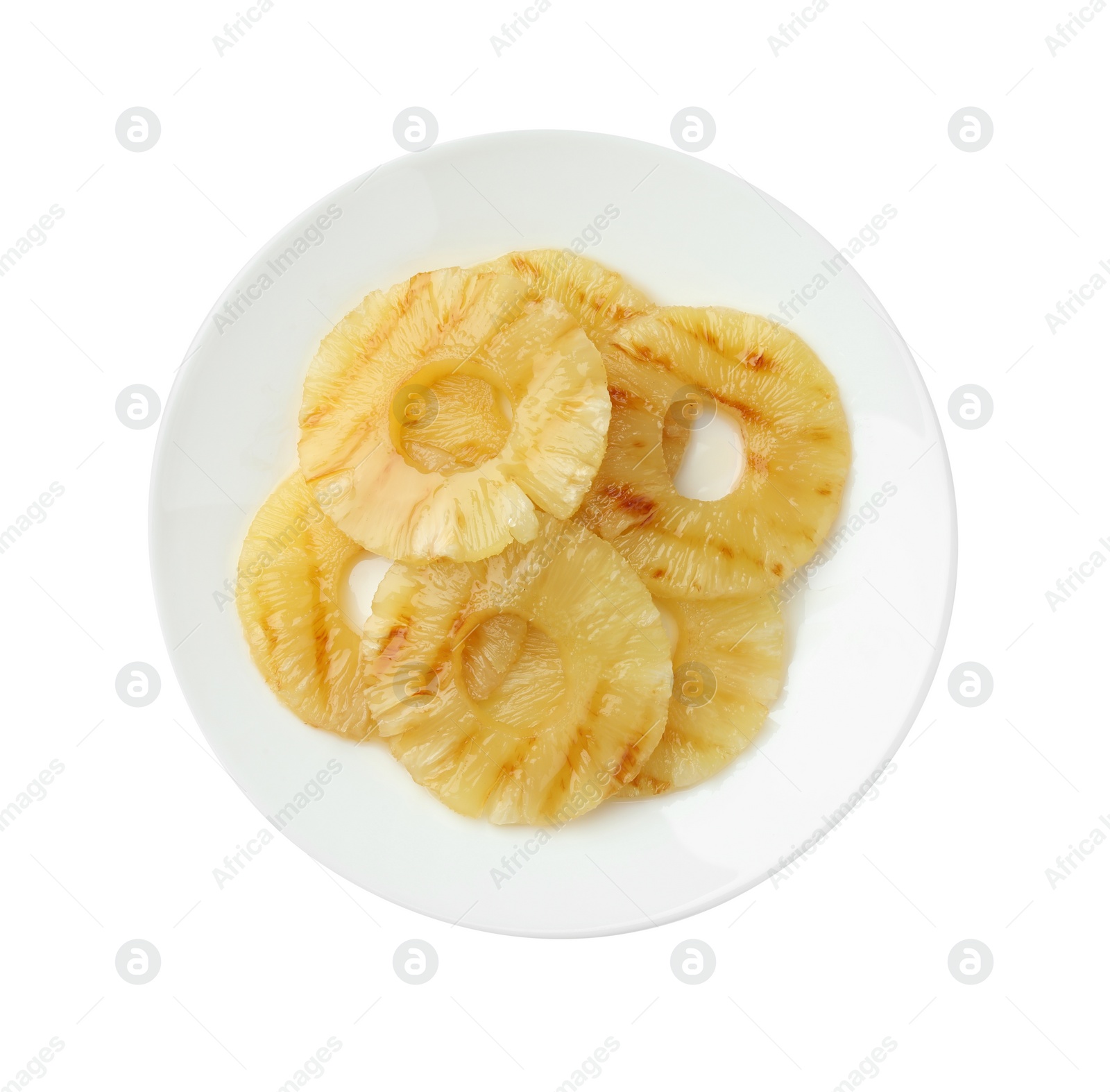 Photo of Tasty grilled pineapple slices isolated on white, top view