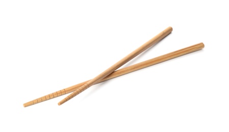 Photo of Chopsticks made of bamboo on white background