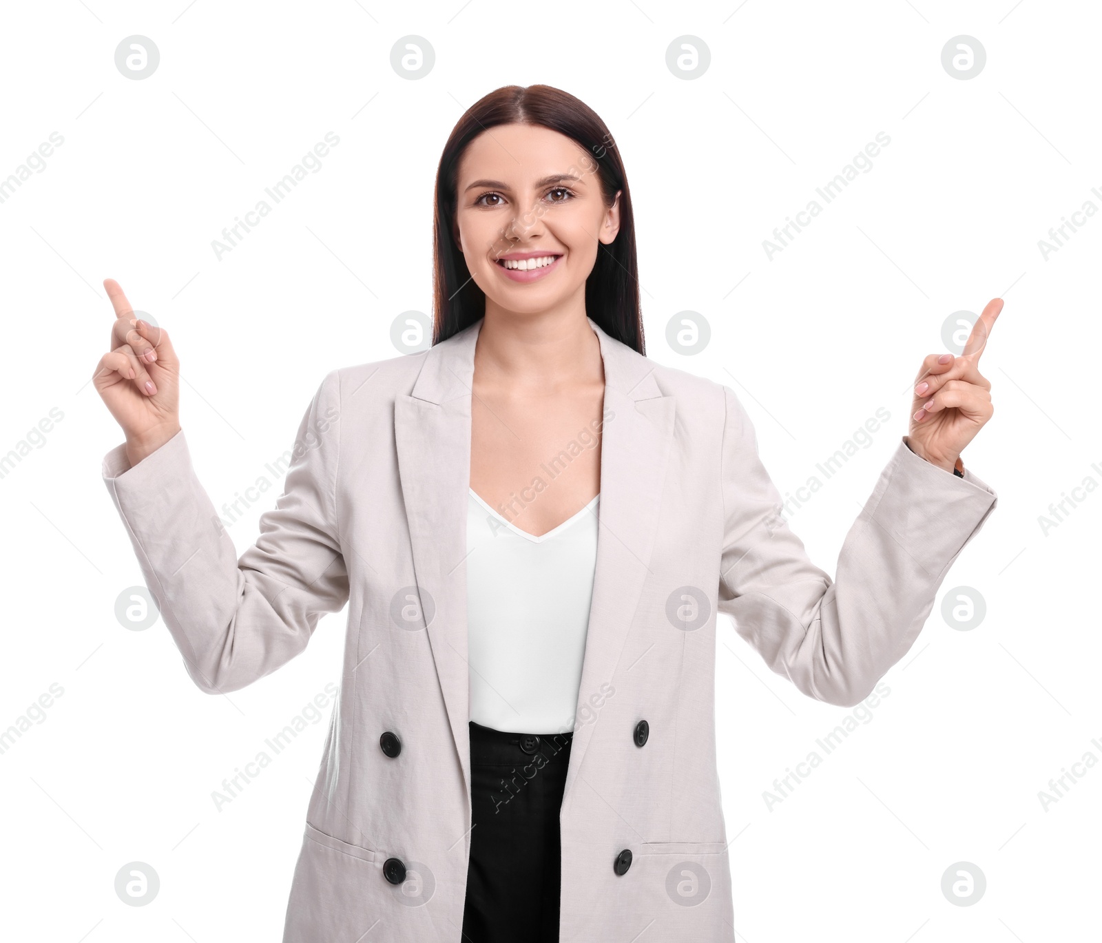 Photo of Beautiful businesswoman in suit pointing at something on white background