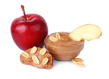 Photo of Slices of fresh apple with peanut butter, fruit and nuts isolated on white