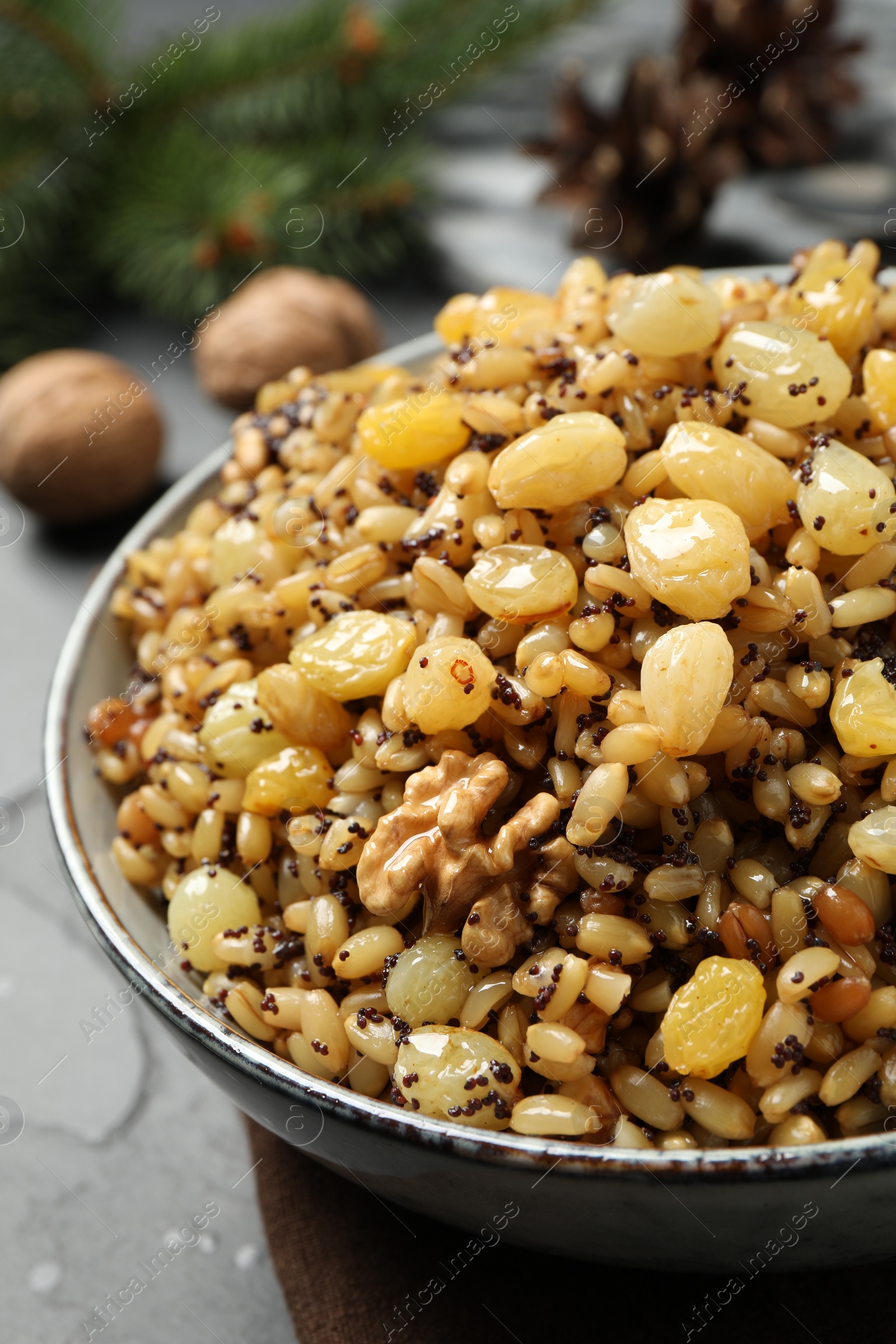 Photo of Traditional Christmas slavic dish kutia in bowl, closeup