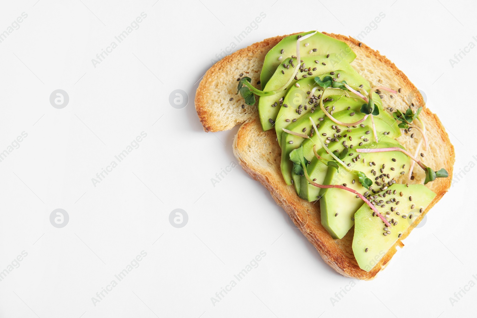 Photo of Tasty toast with avocado, sprouts and chia seeds on white background, top view