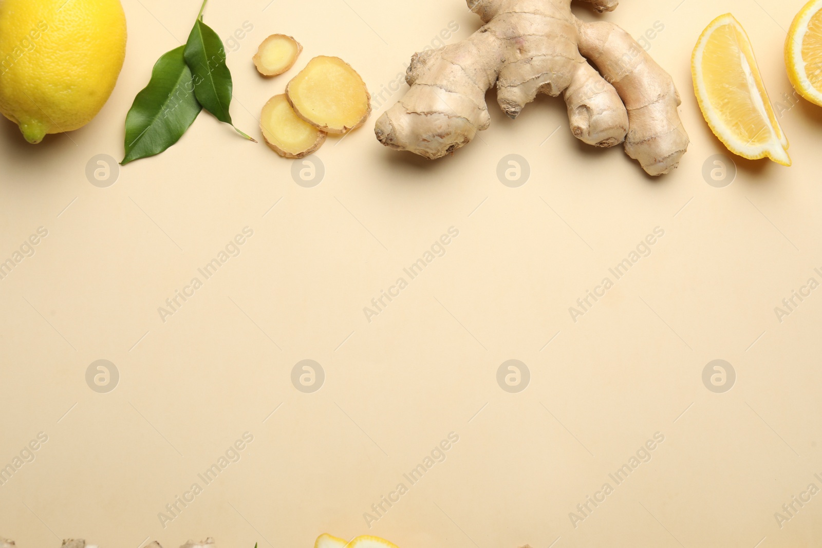 Photo of Fresh lemons and ginger on beige background, flat lay. Space for text