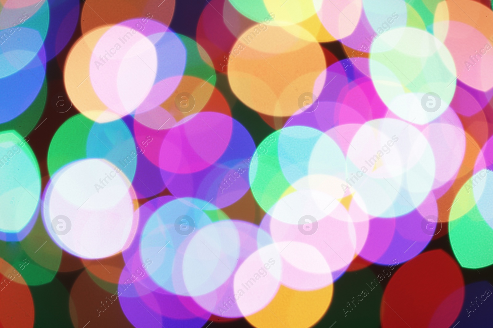 Photo of Beautiful colorful lights as background. Bokeh effect