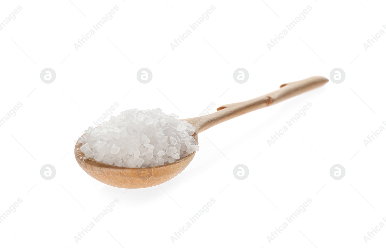 Photo of Wooden spoon with salt isolated on white