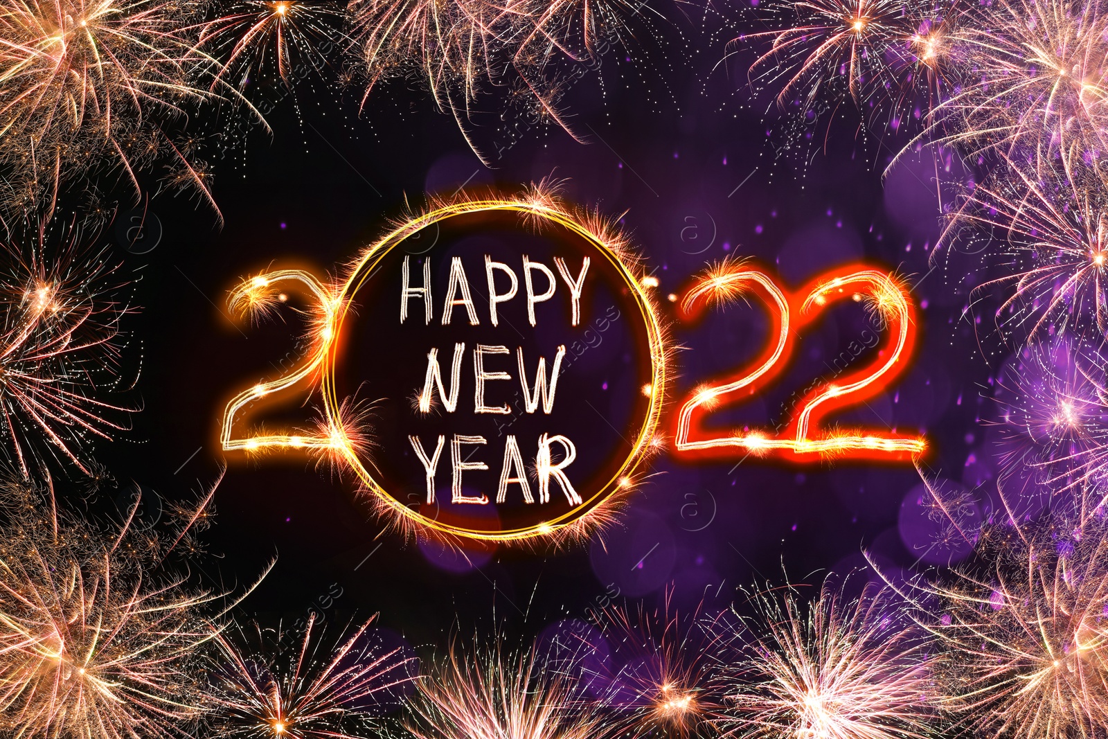 Image of Bright text Happy New 2022 Year made of firework on dark background. Greeting card design