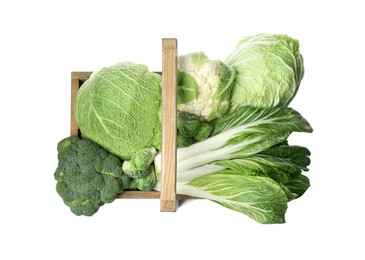 Photo of Wooden crate with different types of fresh cabbage on white background, top view