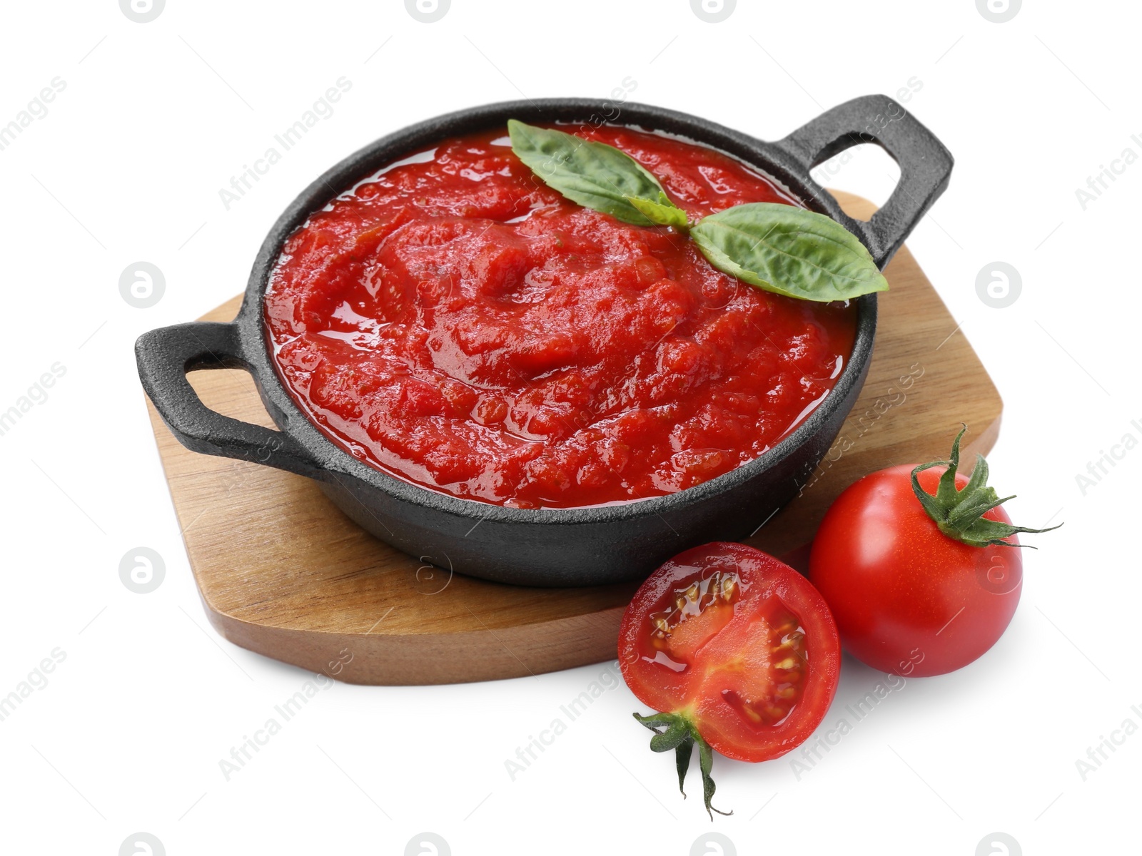 Photo of Homemade tomato sauce in bowl and fresh ingredients isolated on white