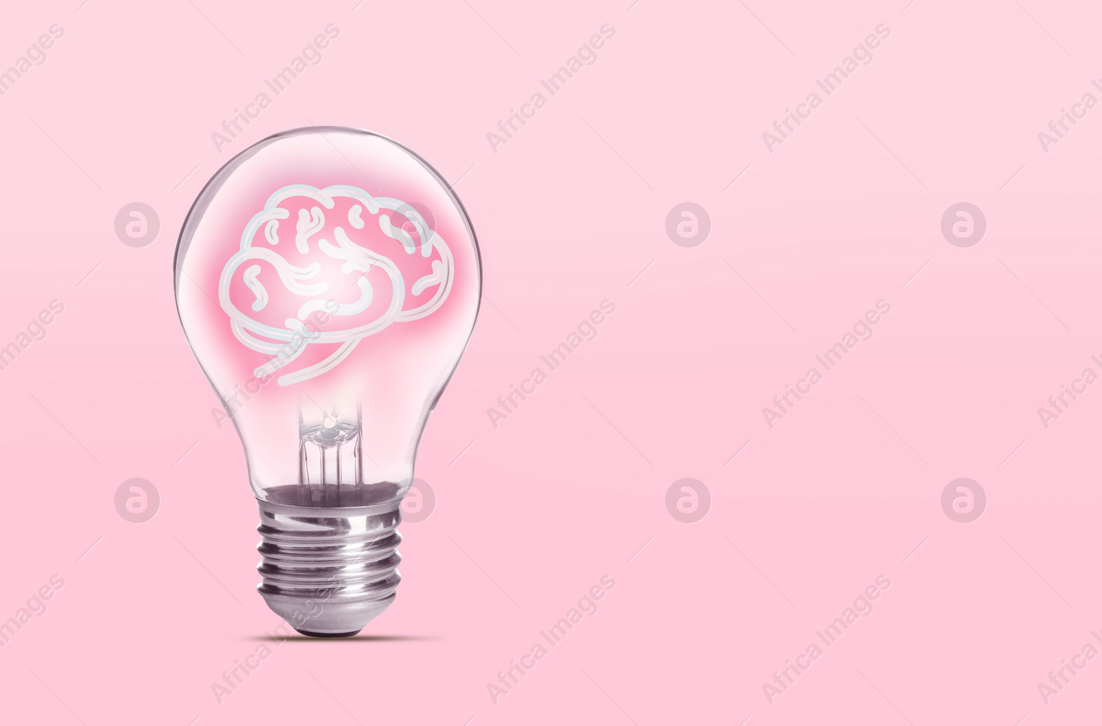 Image of Lamp bulb with human brain inside on pink background, space for text. Idea generation