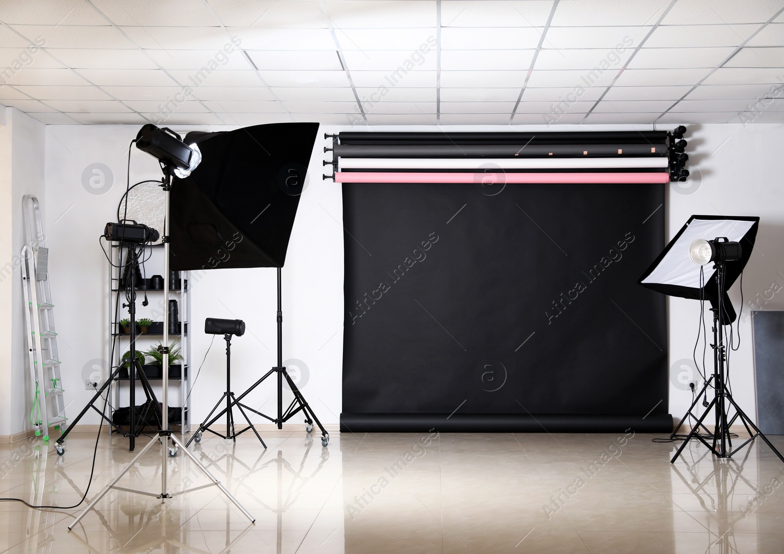 Photo of Photo studio interior with set of professional equipment