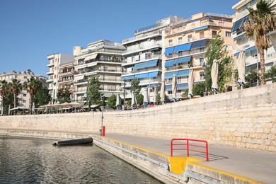 Cityscape of marina district with pier and buildings
