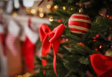 Photo of Christmas tree with stylish decor indoors, closeup