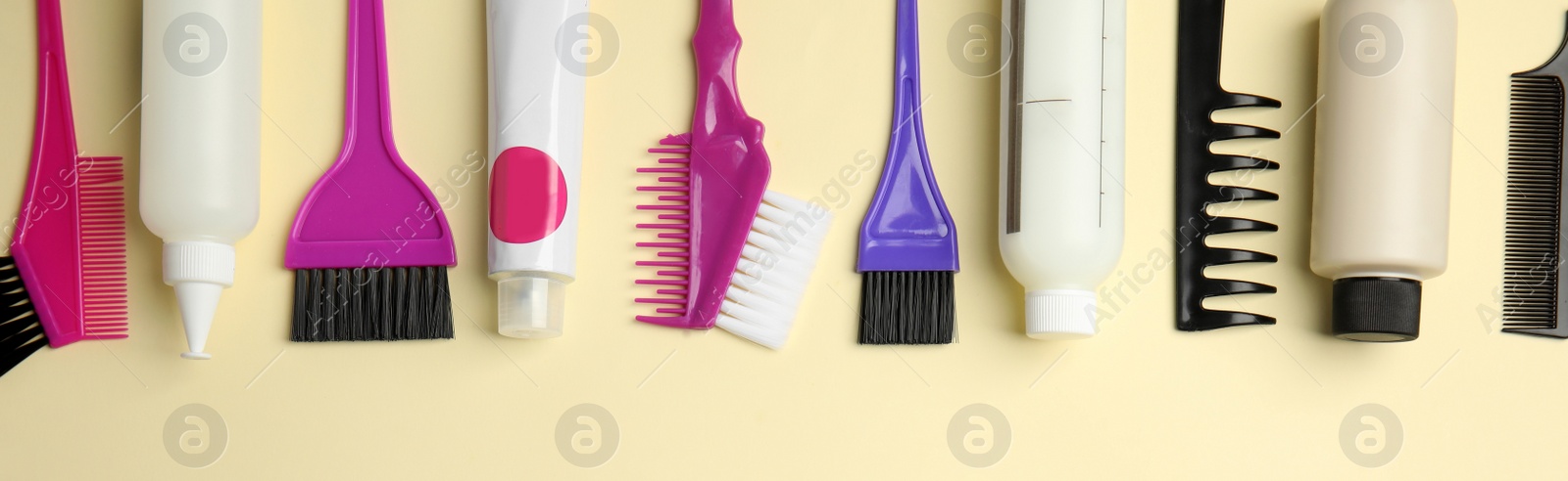 Image of Set of different professional tools for hair dyeing on light background flat lay. Banner design