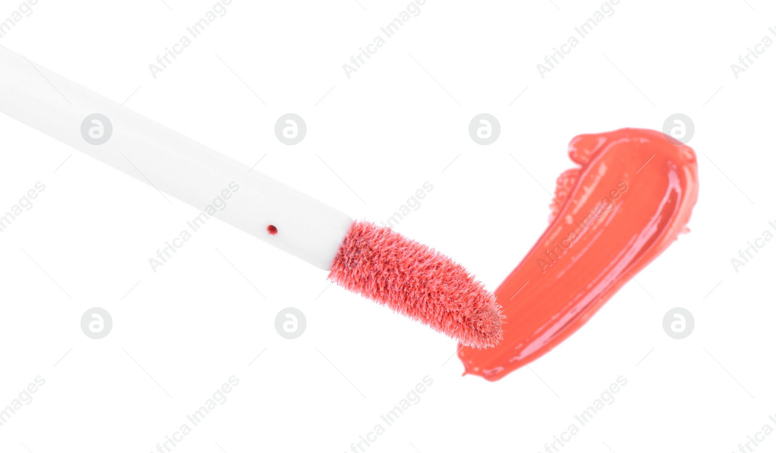 Photo of Stroke of color lip gloss and applicator isolated on white, top view