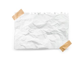 Photo of Crumpled checkered notebook sheet and adhesive tape isolated on white