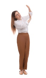 Beautiful businesswoman in suit avoiding something on white background