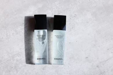 Leiden, Netherlands - July 14, 2022: Chanel cosmetic products on light grey table, flat lay. Space for text