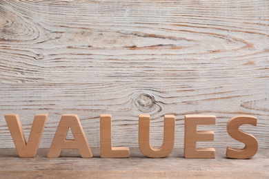 Photo of Word VALUES made with letters on wooden background