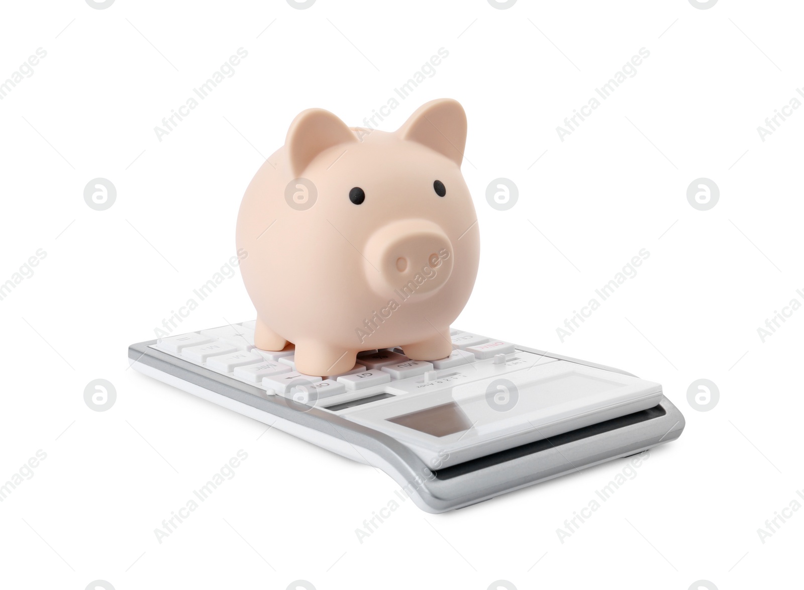 Photo of Calculator and piggy bank isolated on white
