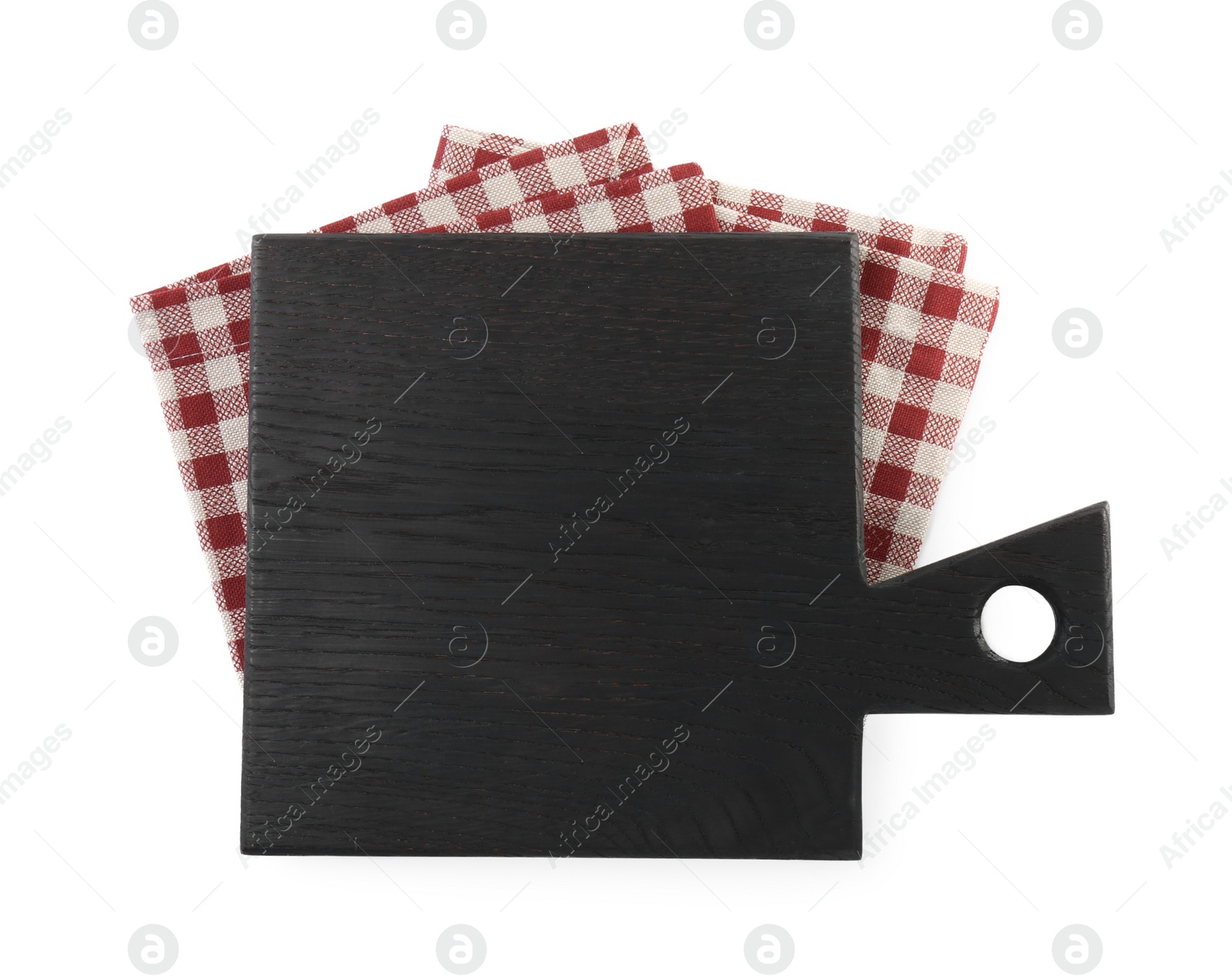 Photo of Black wooden cutting board and napkin isolated on white, top view