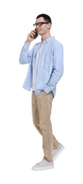 Photo of Young man in glasses talking on mobile phone on white background