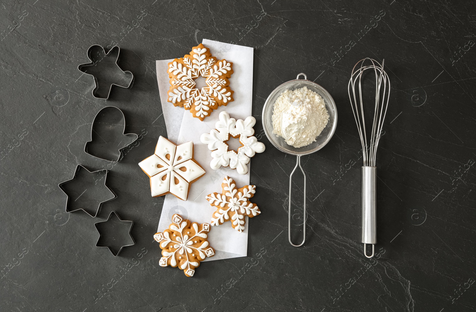 Photo of Flat lay composition with delicious homemade Christmas cookies on black table