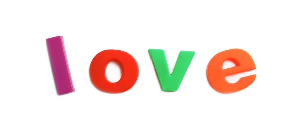 Photo of Word LOVE of magnetic letters on white background, top view