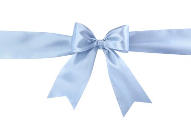 Light blue satin ribbon with bow on white background, top view