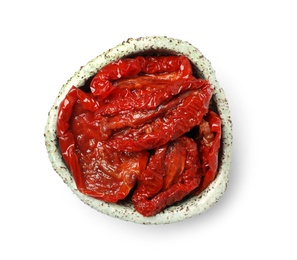 Photo of Bowl with sun dried tomatoes on white background, top view