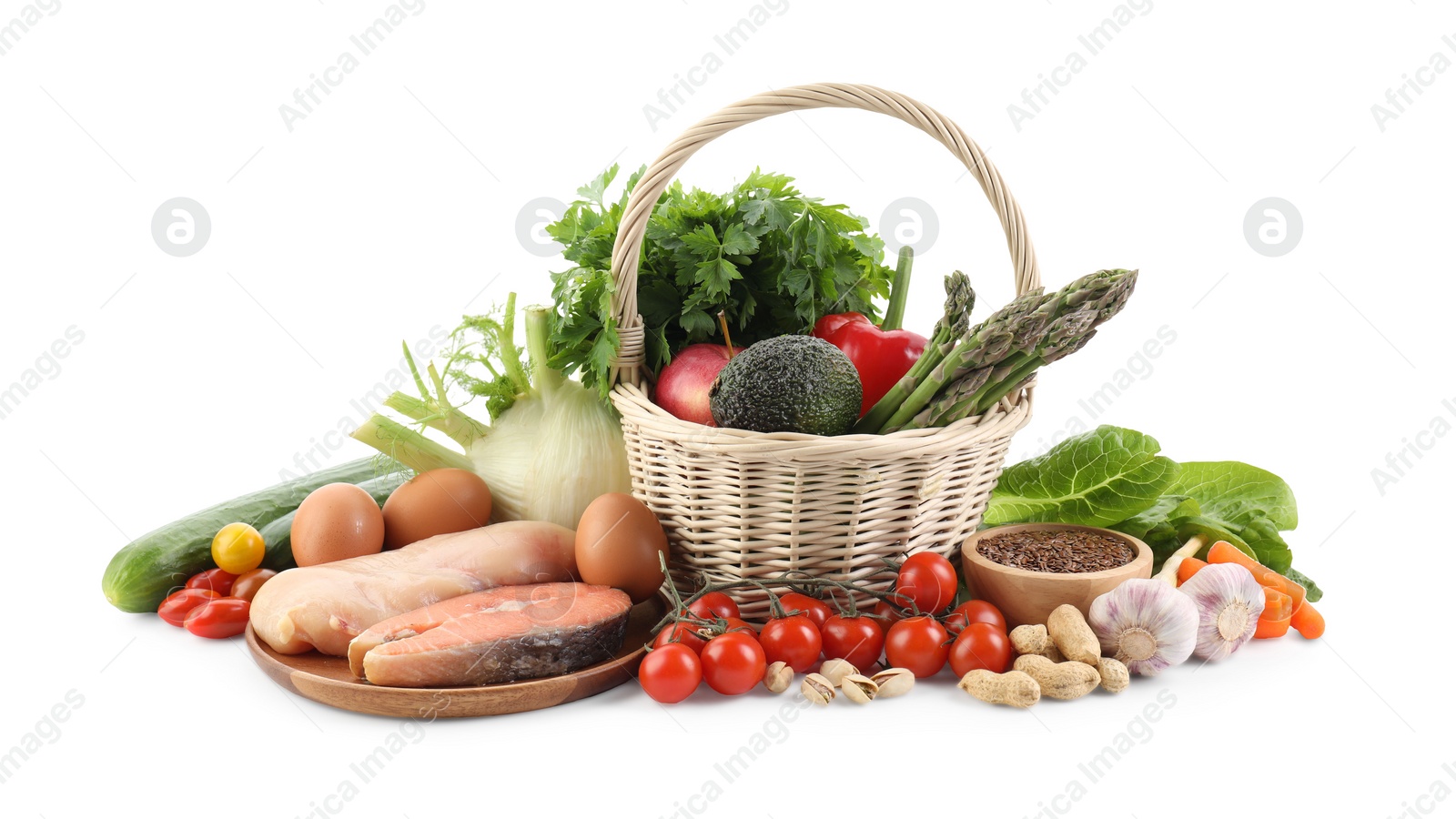 Photo of Healthy food. Basket with different fresh products isolated on white