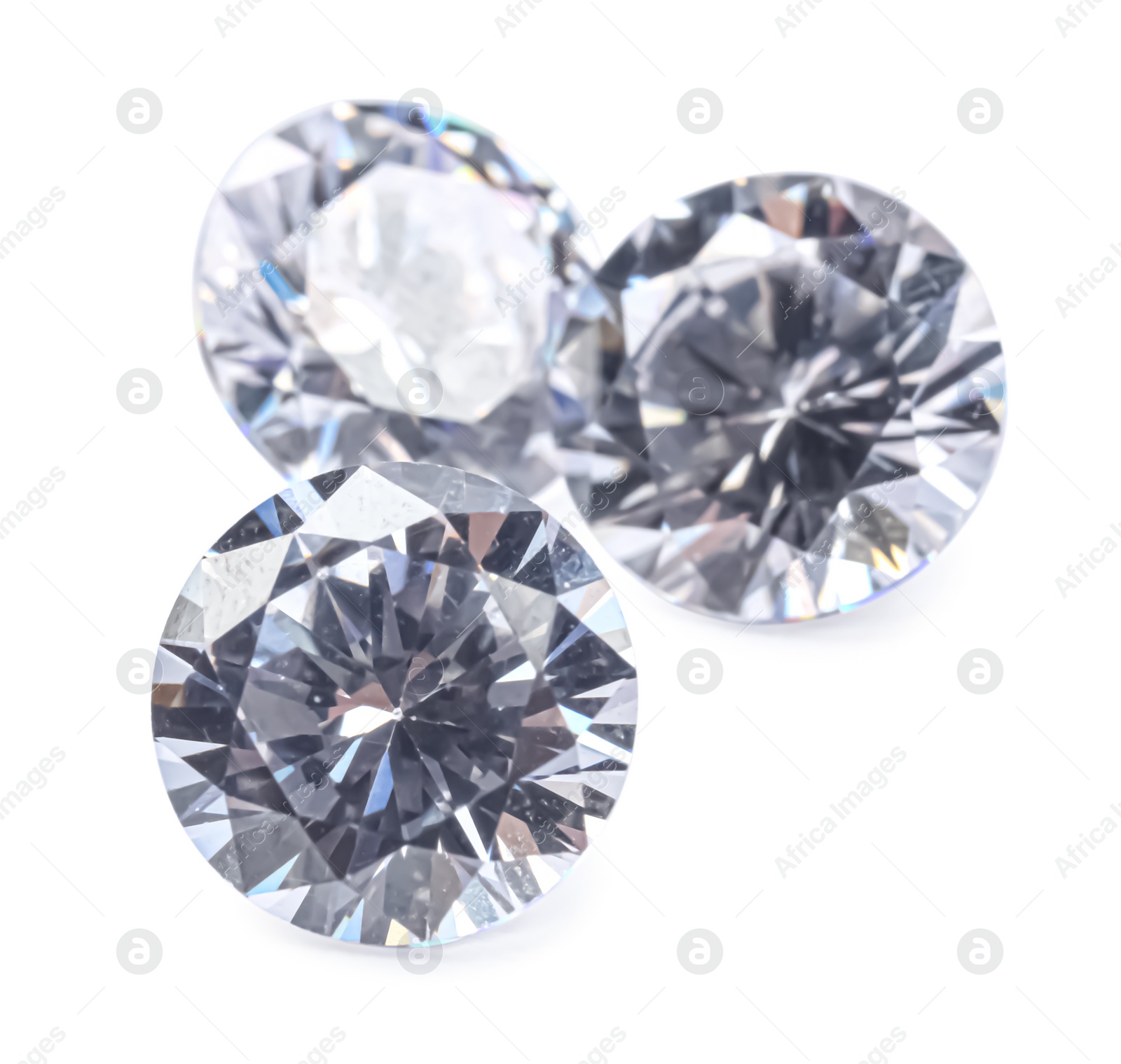 Photo of Different beautiful shiny diamonds isolated on white