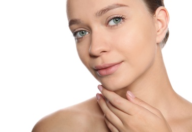 Photo of Portrait of young woman with foundation on her face against white background