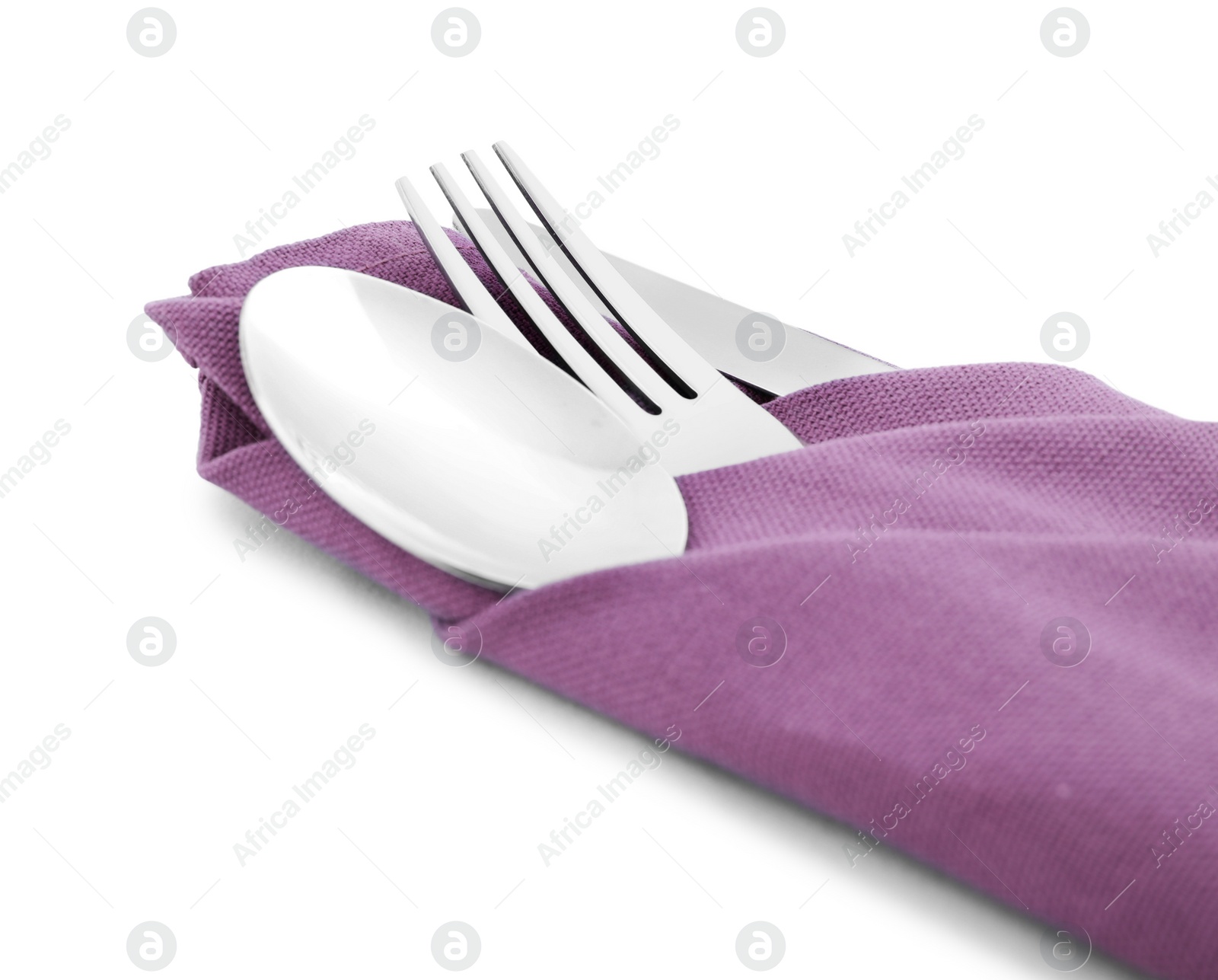 Photo of Clean cutlery with napkin isolated on white